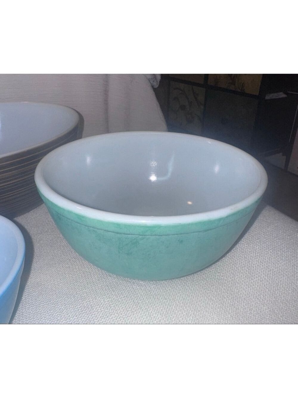 Vintage Pyrex TMREG403823 made in the USA. Green bowl faded no chips or cracks￼￼
